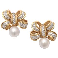 Classic and understated pearl Diamond gold Bow Earrings