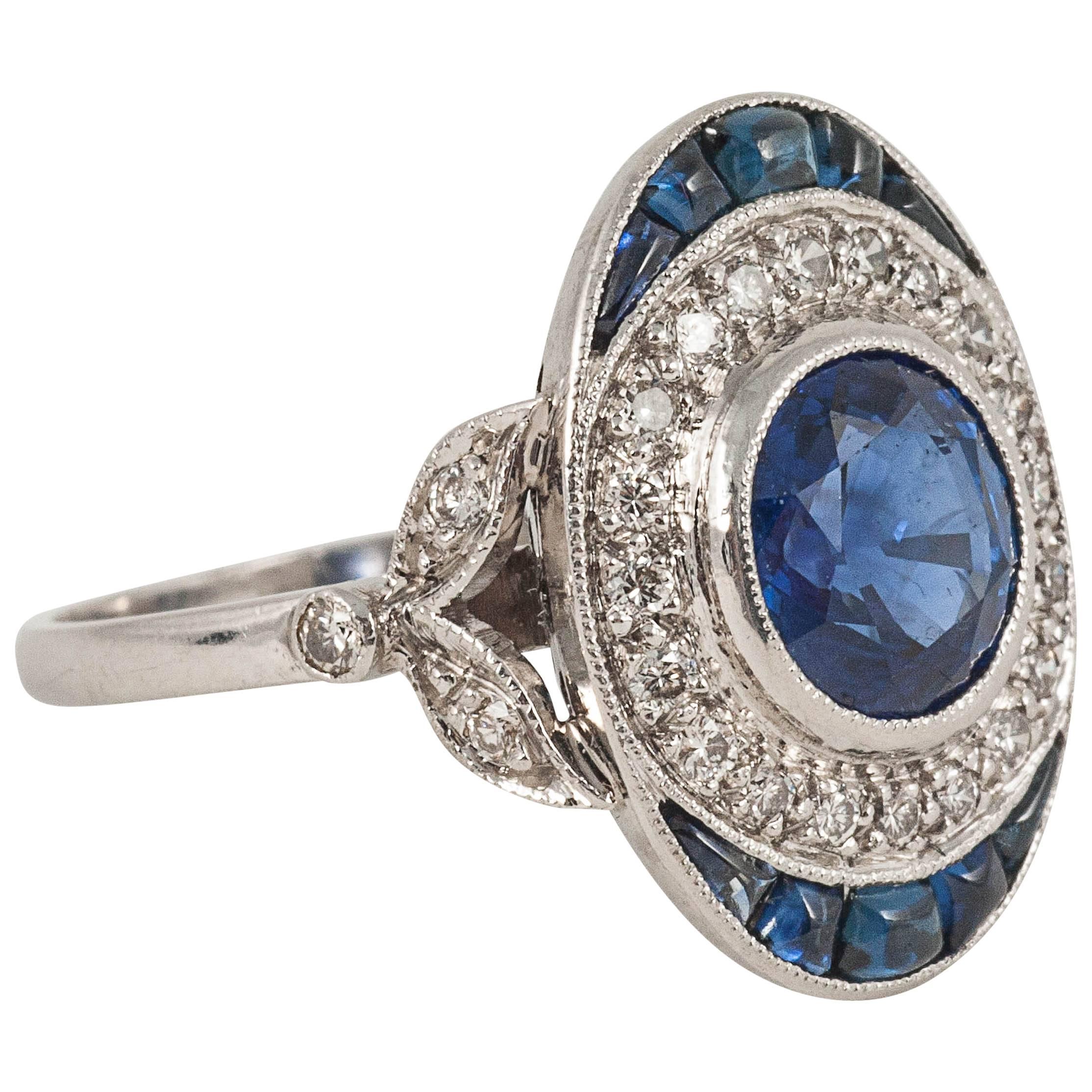 Oval Sapphire Diamond platinum cluster ring For Sale