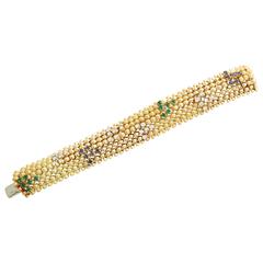 1950s French Sapphire Emerald Diamond Two textured Gold Bracelet
