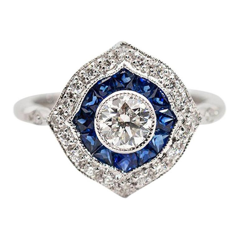 0.50 Carat Round Diamond and Blue Natural Sapphire 18 Carat White Ring