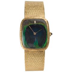 Corum lady's Yellow Gold Peacock Feather dial Wristwatch