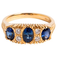 Sapphire and Diamond Cluster Ring, 18 Karat Yellow Gold Band, Boatstyle