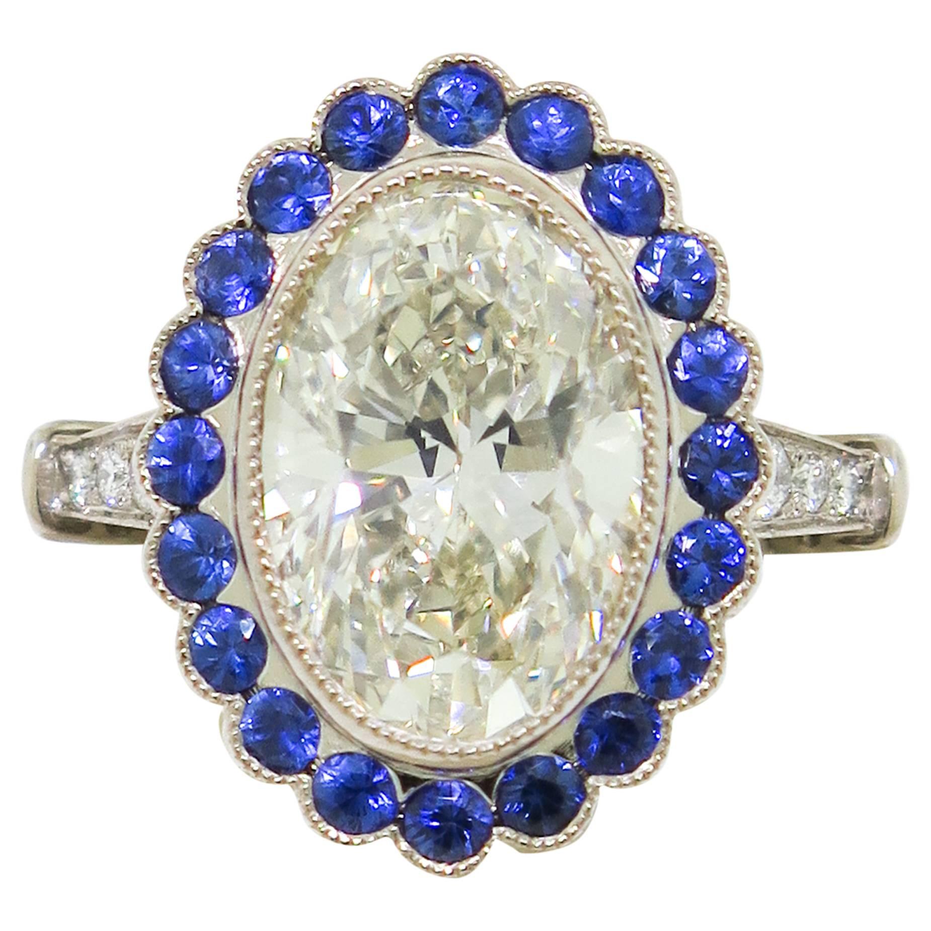 3.37 Carat Oval Diamond with Sapphire Halo White Gold Ring