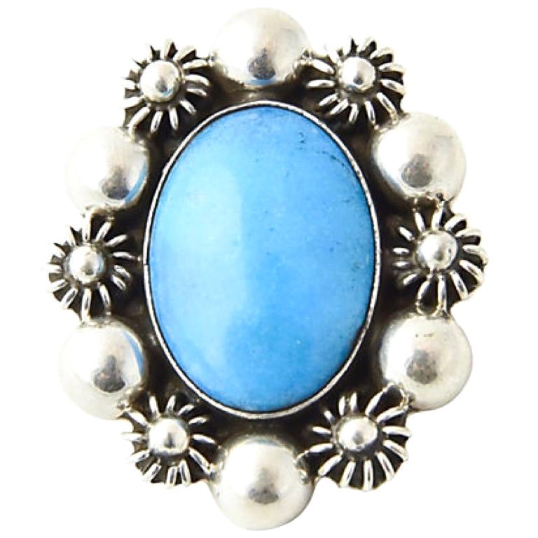 Sterling Silver Floral Frame with Turquoise Center Brooch