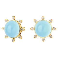 Ohrringe aus Gelbgold mit blauem Topas und Diamanten von Syna