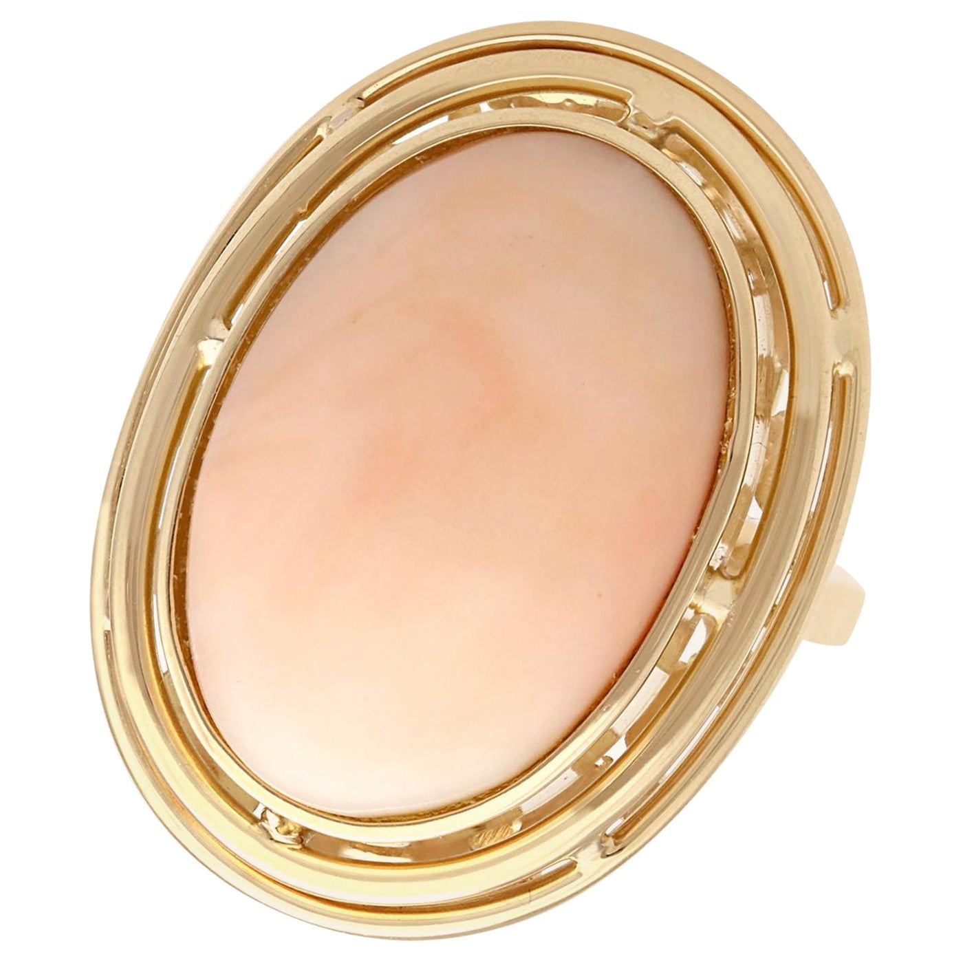 1960s 13.98 Carat Cabochon Cut Coral and Yellow Gold Cocktail Ring