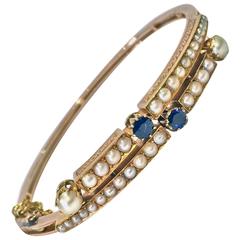 1890s Antique English Pearl Sapphire Gold Bangle Bracelet