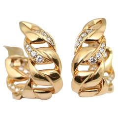 Cartier diamond gold ear clips