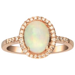 1.29 Carat Natural Opal and Diamond 14 Karat Rose Gold Ring