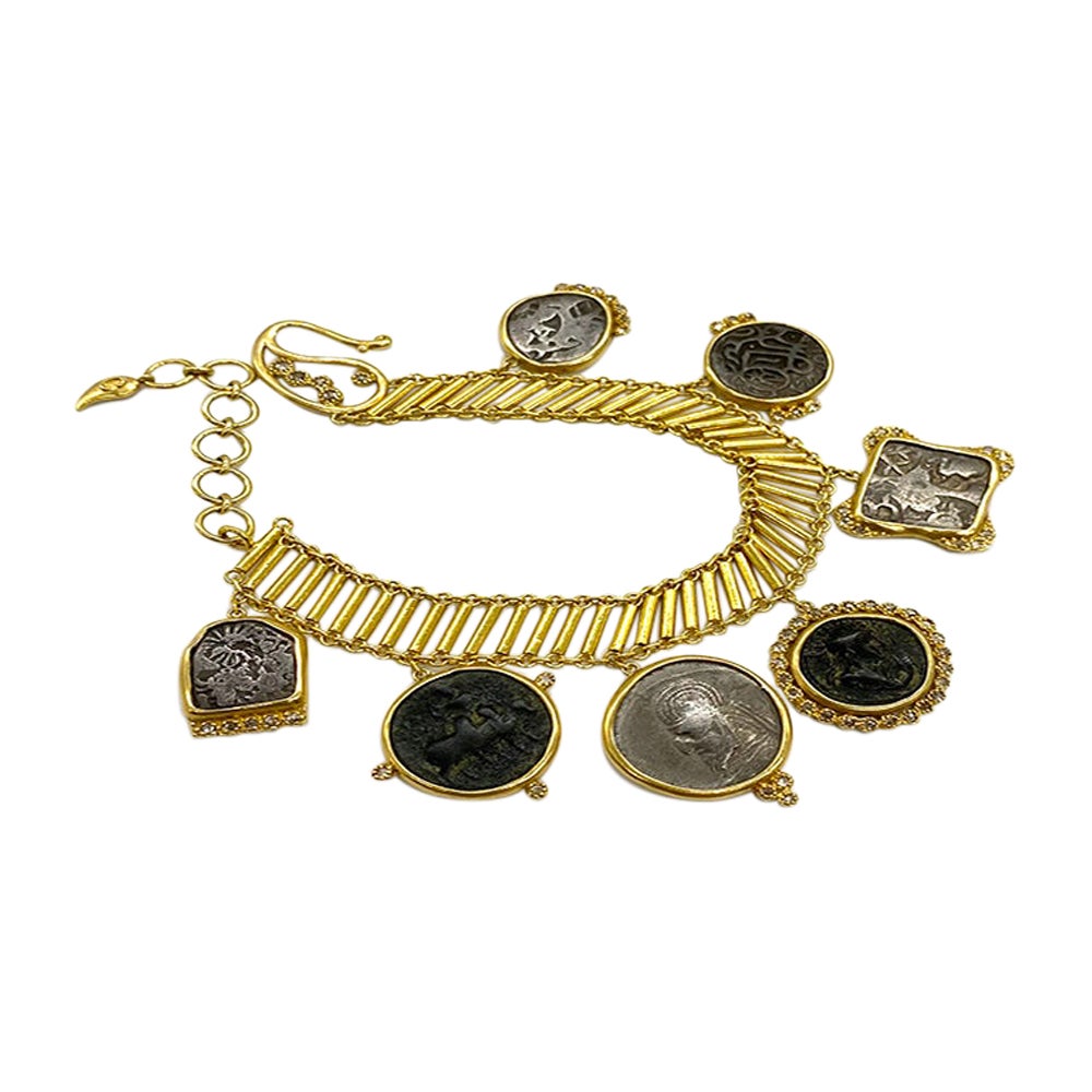 Coin Bracelet Set in 20 Karat Yellow Gold with Antique Hanging Coins