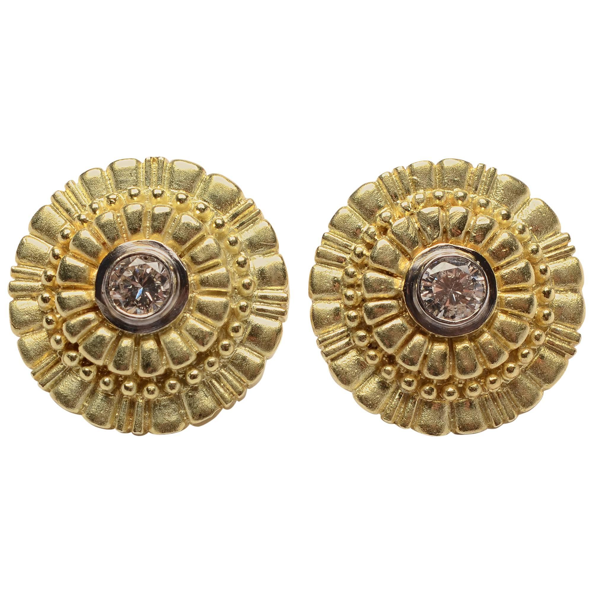 Round Gold Earrings centerd with Diamonds