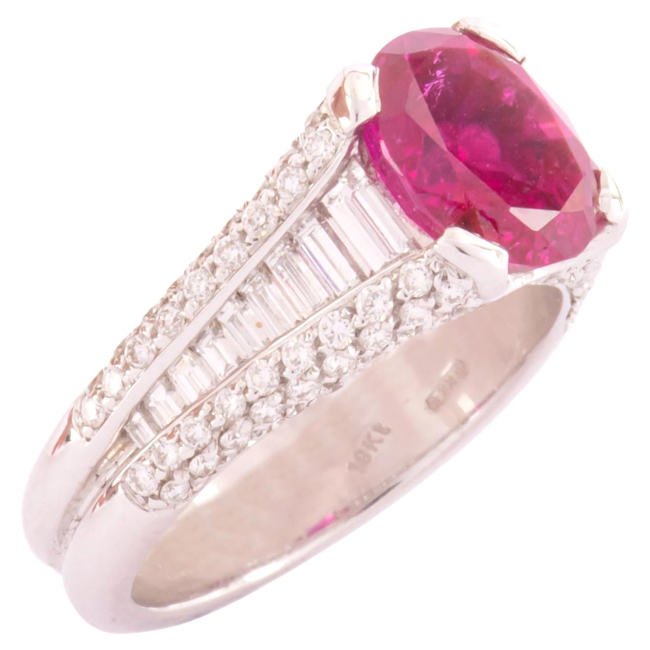 18k White Gold 3, 15 Carat Oval Ruby with Round and Baguettes Diamonds, Ring For Sale