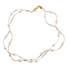 Elaine Firenze Collier de double perle torsadé en or rose et blanc 18 carats.