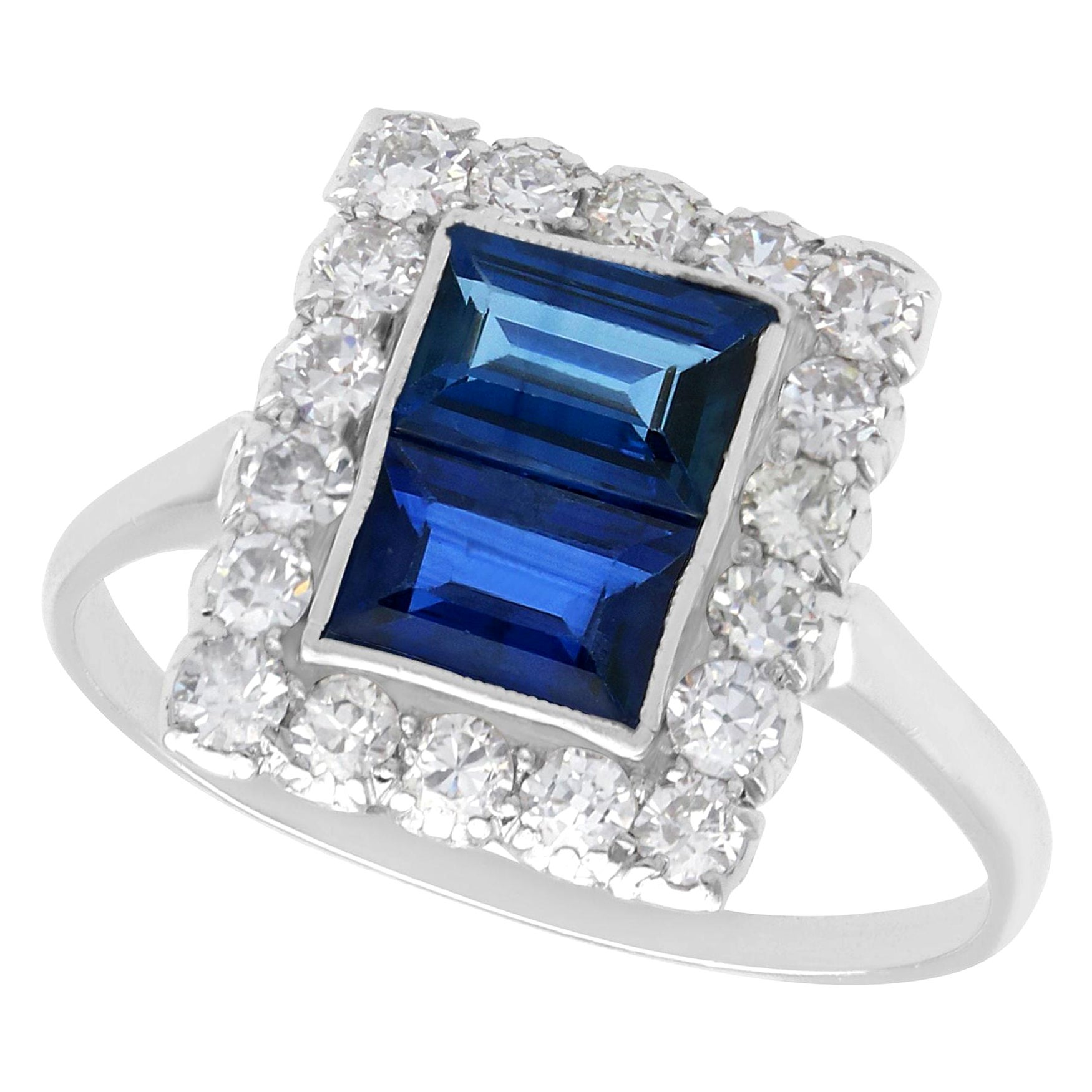 1930s, Antique 1.60 Carat Sapphire and Diamond Platinum Cluster Ring