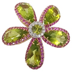 Peridot with Pink Sapphire and Diamond Flower Rings Set in 18 Karat White Gold