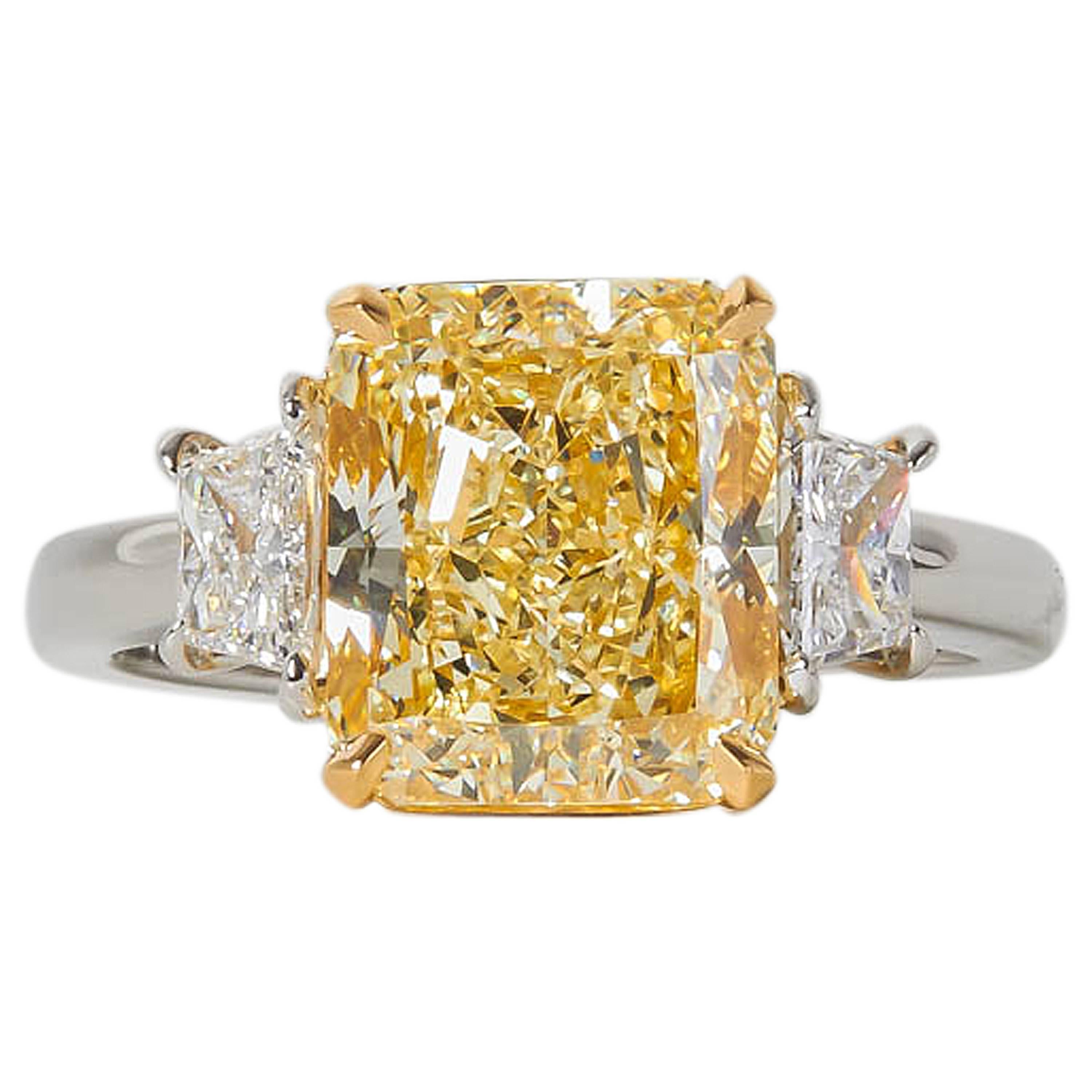 4 carat GIA certified Fancy Light Yellow Diamond Platinum Ring