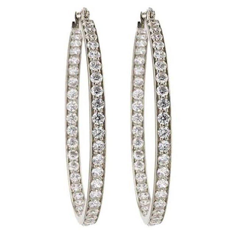 Clove Huggie Hoop Earrings In Rhodium/ Black Cats Eye