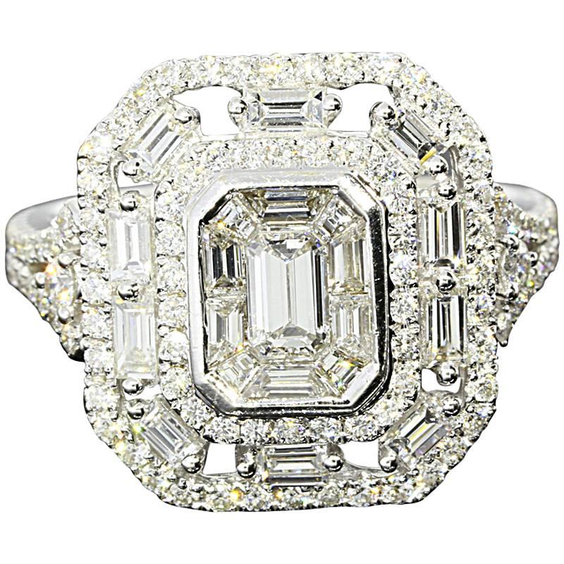 Halo-Ring aus Gold mit Smaragd und Baguette-Diamant