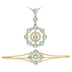 1910s Antique 4.42 Carat Aquamarine and Pearl Yellow Gold Pendant and Brooch Set