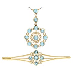 1910s Antique 4.42 Carat Aquamarine and Pearl Yellow Gold Pendant and Brooch Set