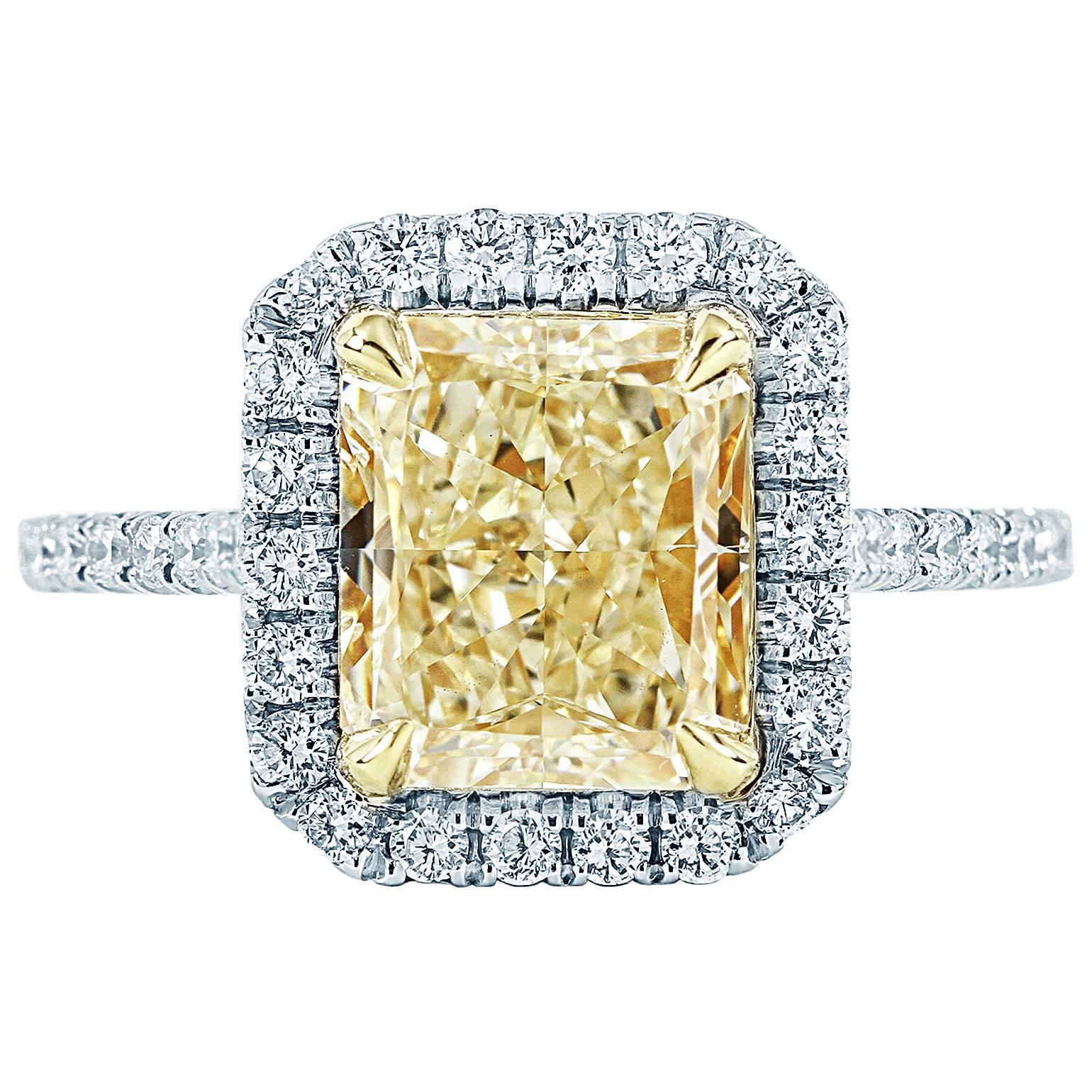 3.62 GIA cert Radiant  Fancy Yellow diamond Gold Halo Engagement Ring For Sale