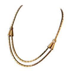 Collana a briscola in oro e diamanti degli anni '50