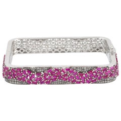 Manchette carrée de créateur en or et argent avec rubis baguette rose et diamants pavés