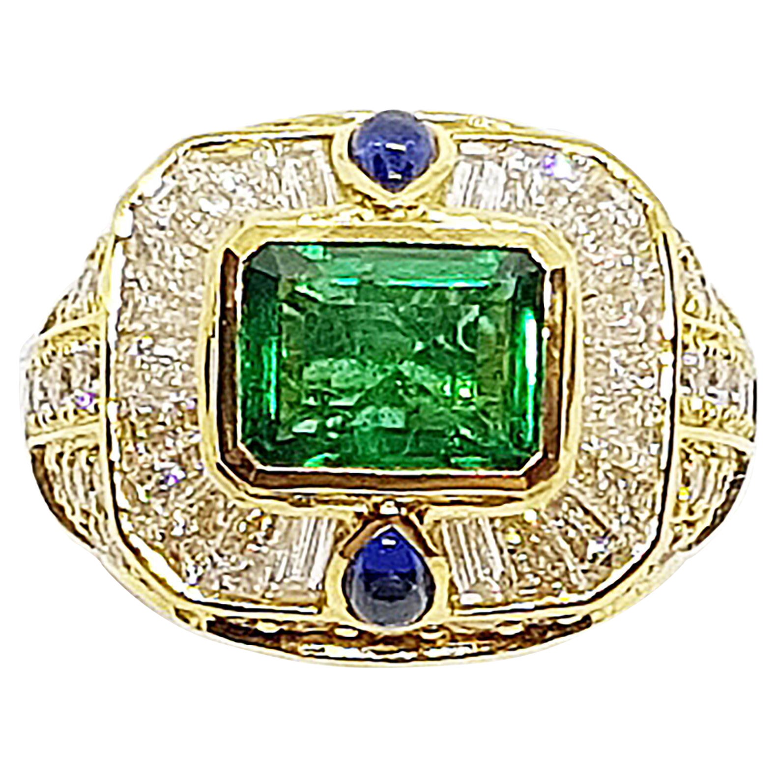 Emerald with Diamond and Cabochon Blue Sapphire Ring in 18 Karat Gold Settings For Sale