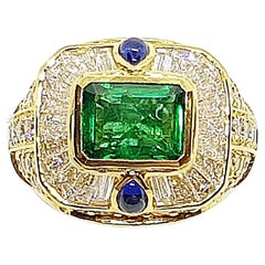 Emerald with Diamond and Cabochon Blue Sapphire Ring in 18 Karat Gold Settings