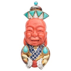 Two Colored Gold Buddha Clip Brooch with Coral, Turquoise, Sapphire and Diamonds