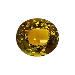 79,78 carati di tormalina olivastra dorata ovale, gemma sfusa, certificata GIA