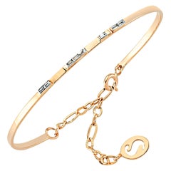 Bracelet en or rose 14K avec diamant baguette blanc par Selda Jewellery