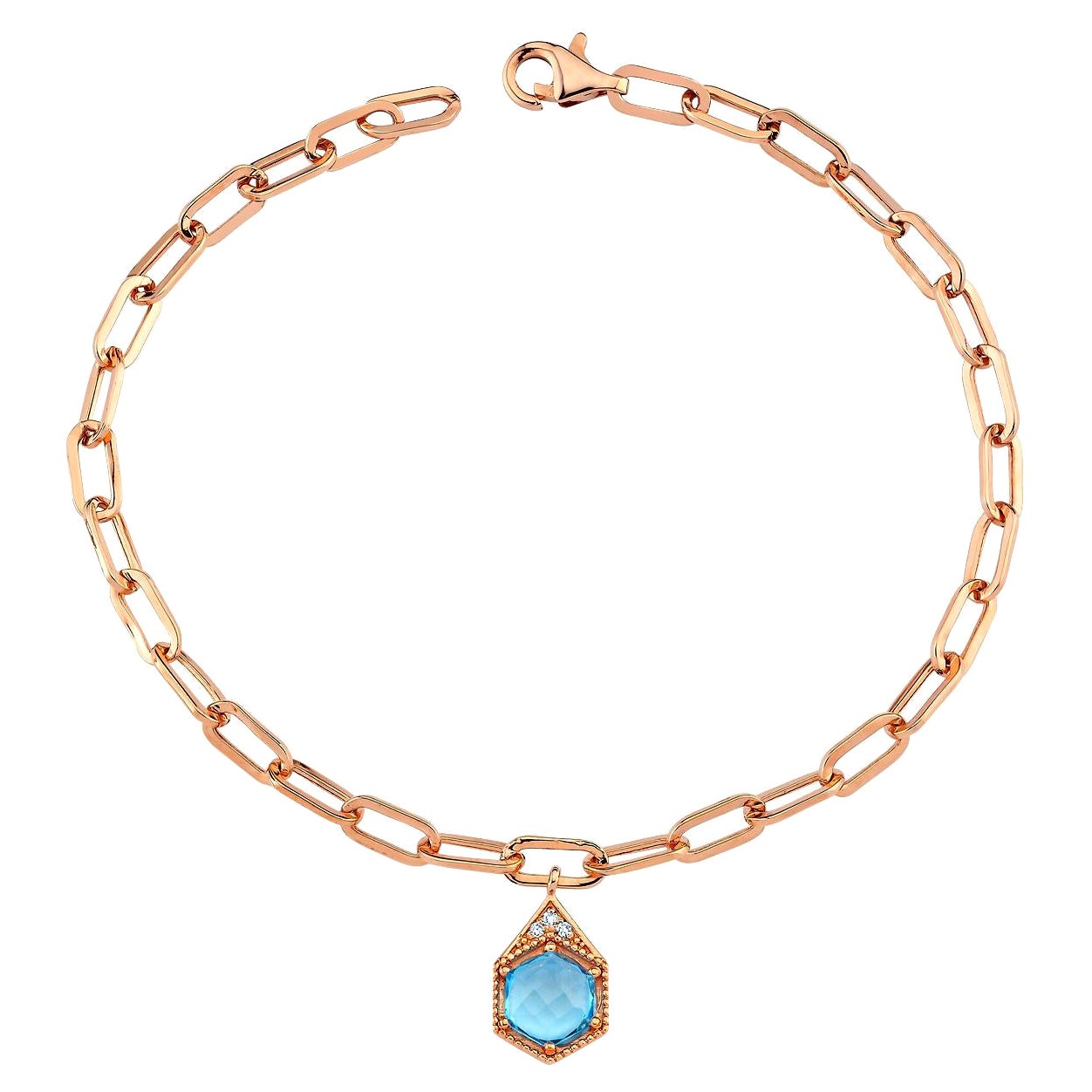 Bracelet de naissance en or rose 14 carats et topaze bleue, décembre par Selda Jewellery