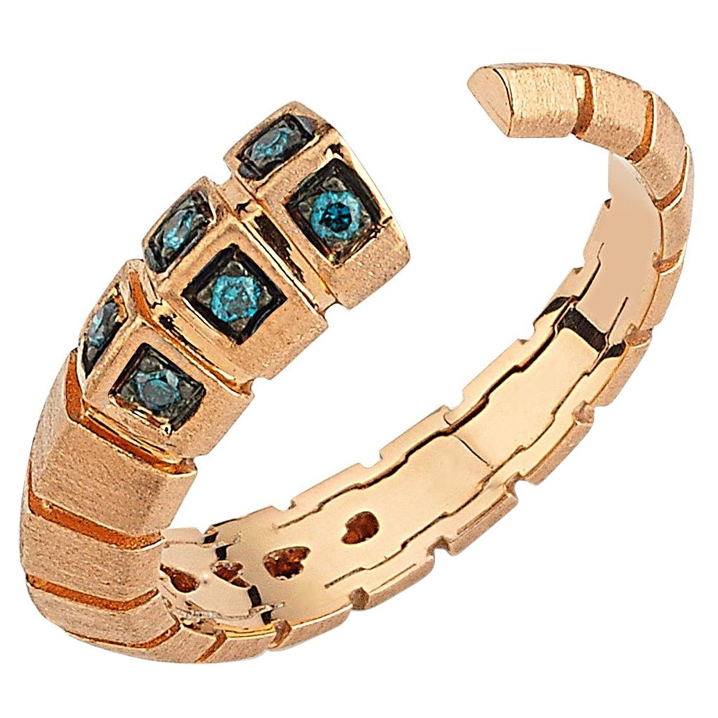Offener Ring mit Drachenschleife aus Roségold mit blauem Diamant