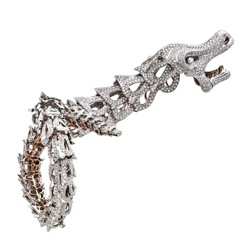  Amazing Unique articulated diamond paved dragon bracelet and ring For Sale