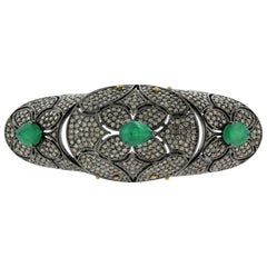 Designer Knuckle Ring with Emerald Stones Surrounded by Pave Diamonds