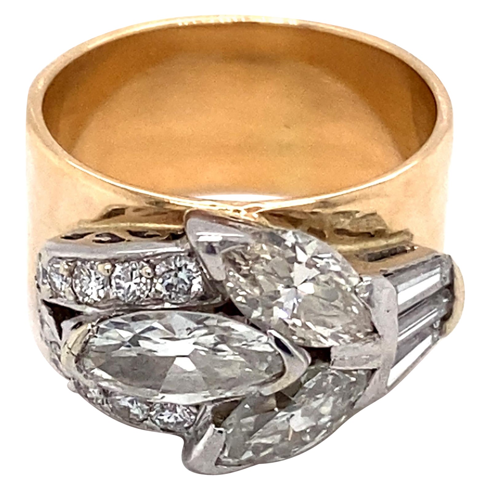 Item Details: 
Ring Size: 7.5, resizable 
Metal Type: 14 Karat Two Tone White and Yellow Gold
Weight: 12.3 grams
Finger to top of stone measures 7 millimeters


Center Diamond Details:
Cut:  Marquise
Carat: 1.91 Carats total weight
Color:
