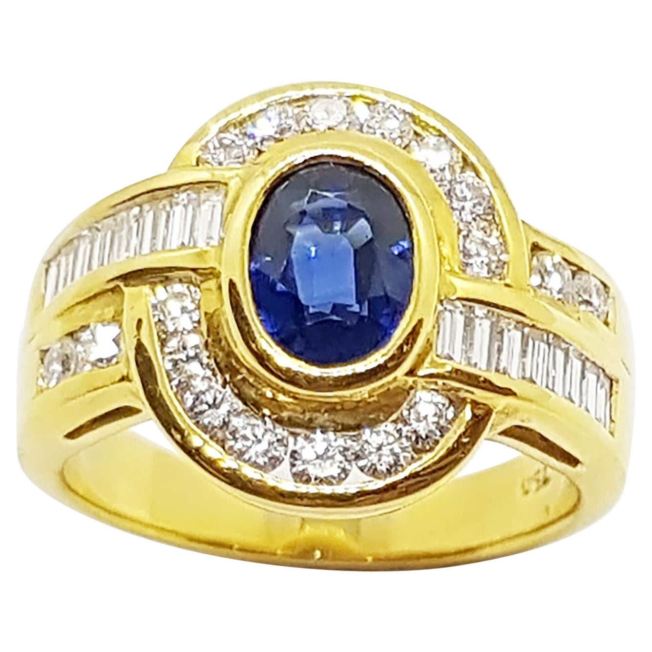 Anello con zaffiro blu e diamanti incastonati in oro 18 carati