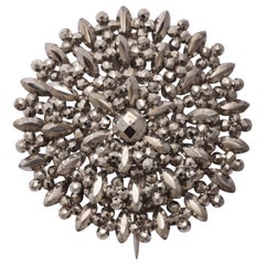 Broche georgiano de acero corten
