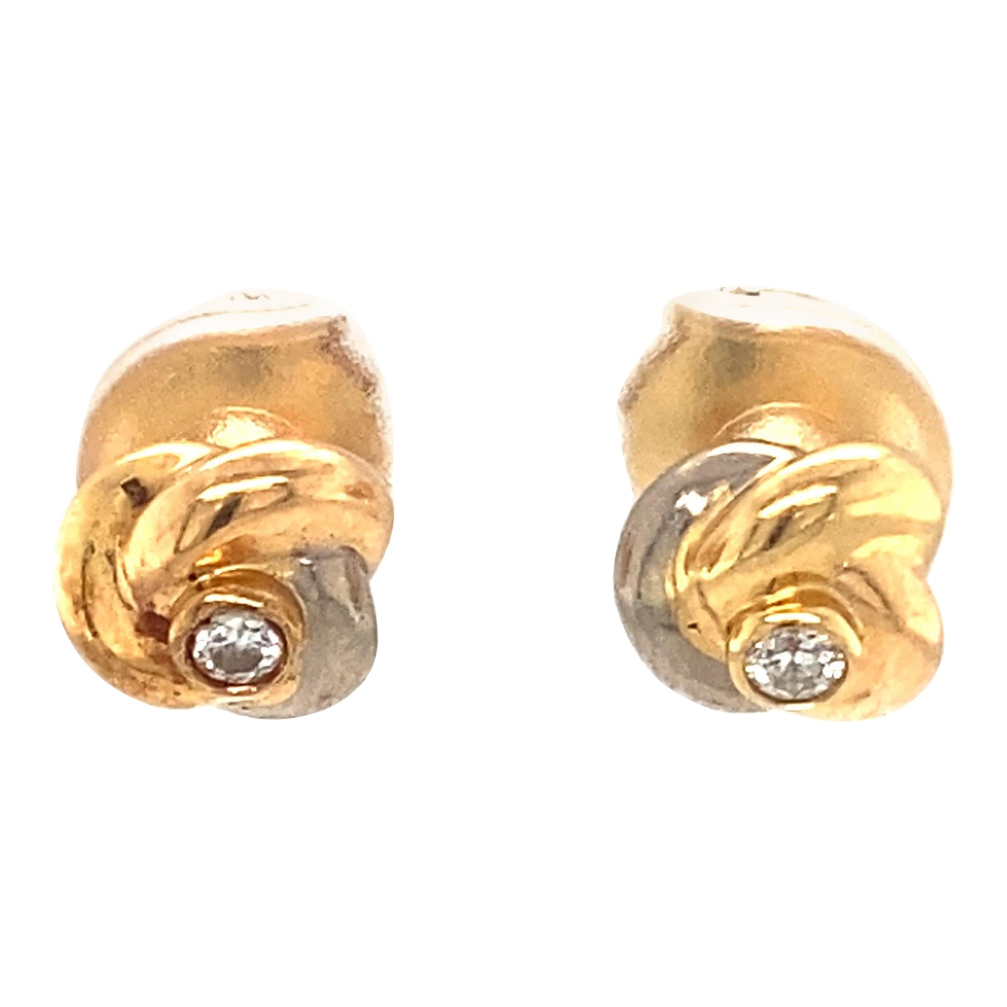 Cartier .08 Carat Diamond Swirl Earrings in 18 Karat Yellow and White Gold
