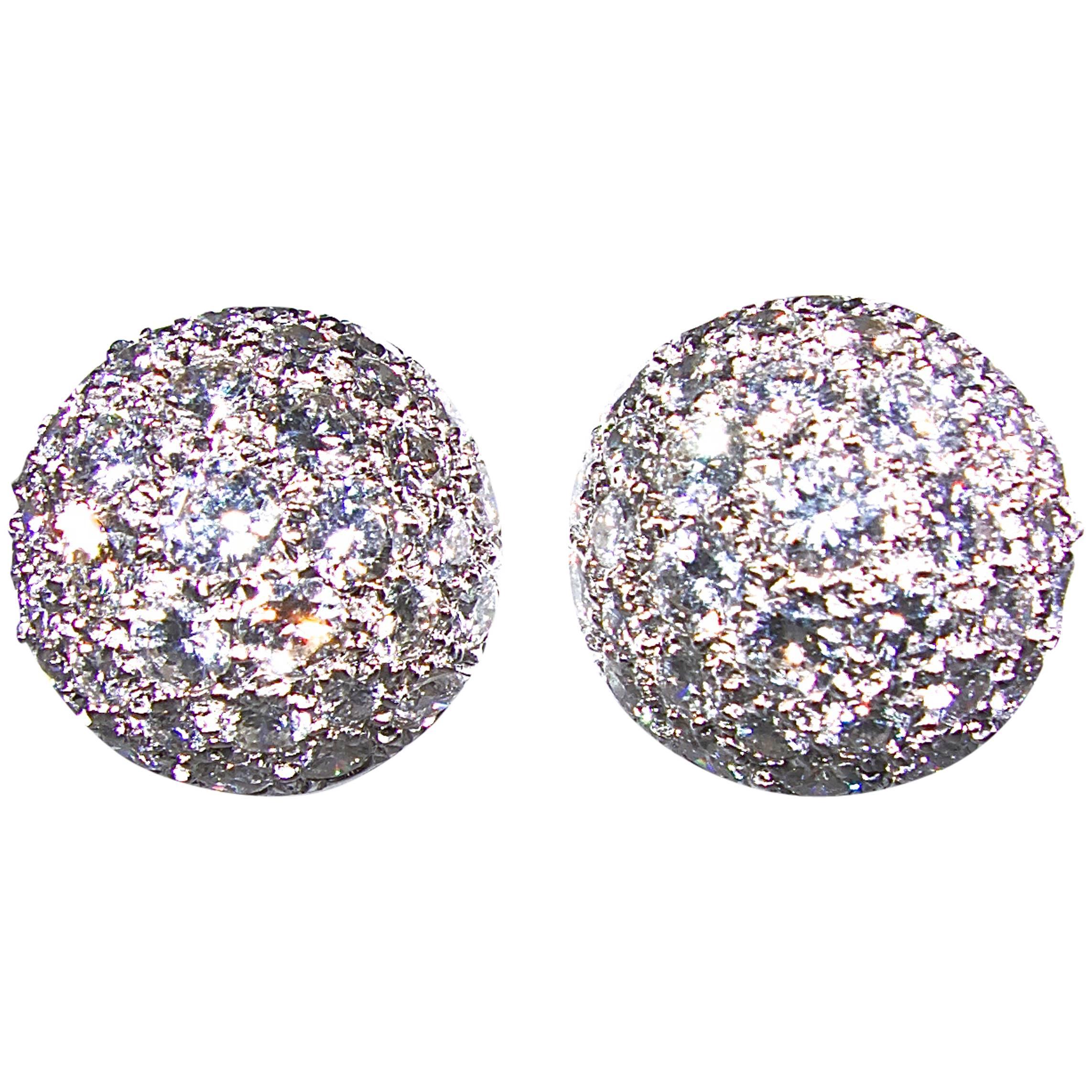diamond pave Platinum half sphere earrings.