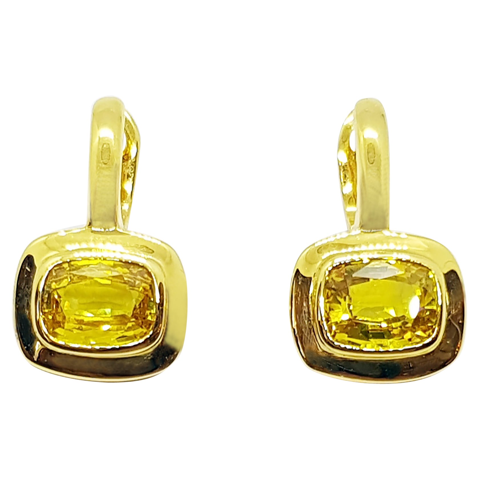 Yellow Sapphire Earrings Set in 18 Karat Gold Settings For Sale