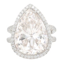 Platinum Diamond Ring with Pear Shape Diamond Center