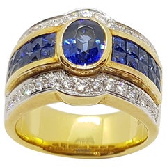 Anello con zaffiro blu e diamante e zaffiro blu incastonati in oro 18 carati