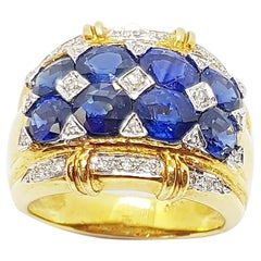 Bague en saphir bleu et diamants sertis en or 18 carats