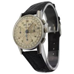 Heuer Stainless Steel Tourneau Triple Date Chronograph Wristwatch