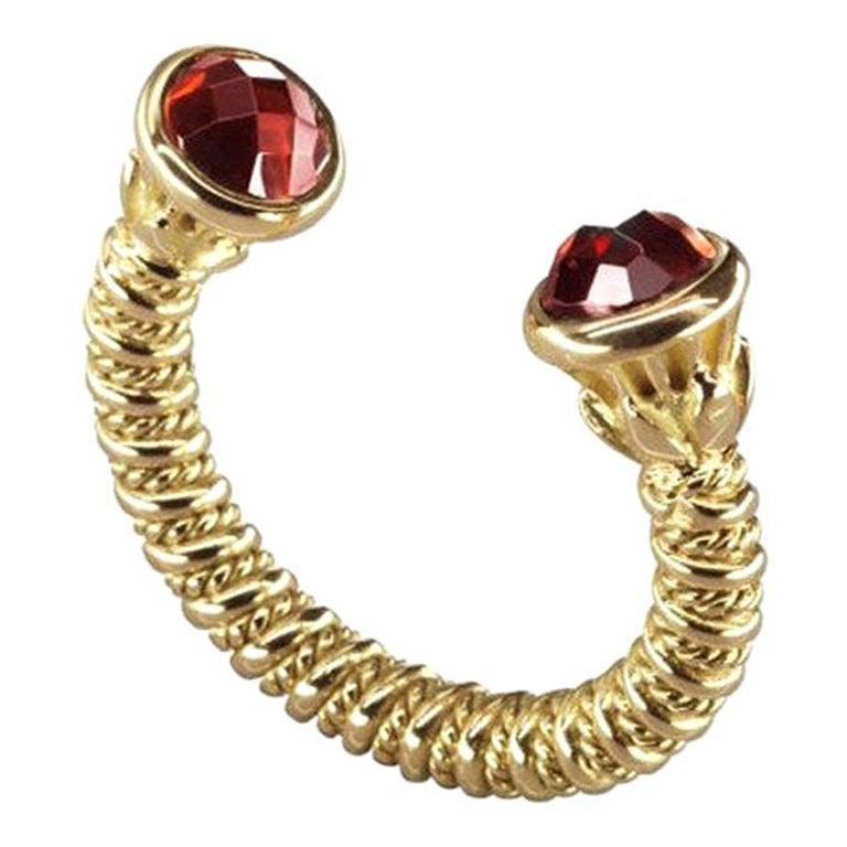 For Sale:  18 Karat Gold and 3.50 Carat Garnet Limited Lotus Coil Ring