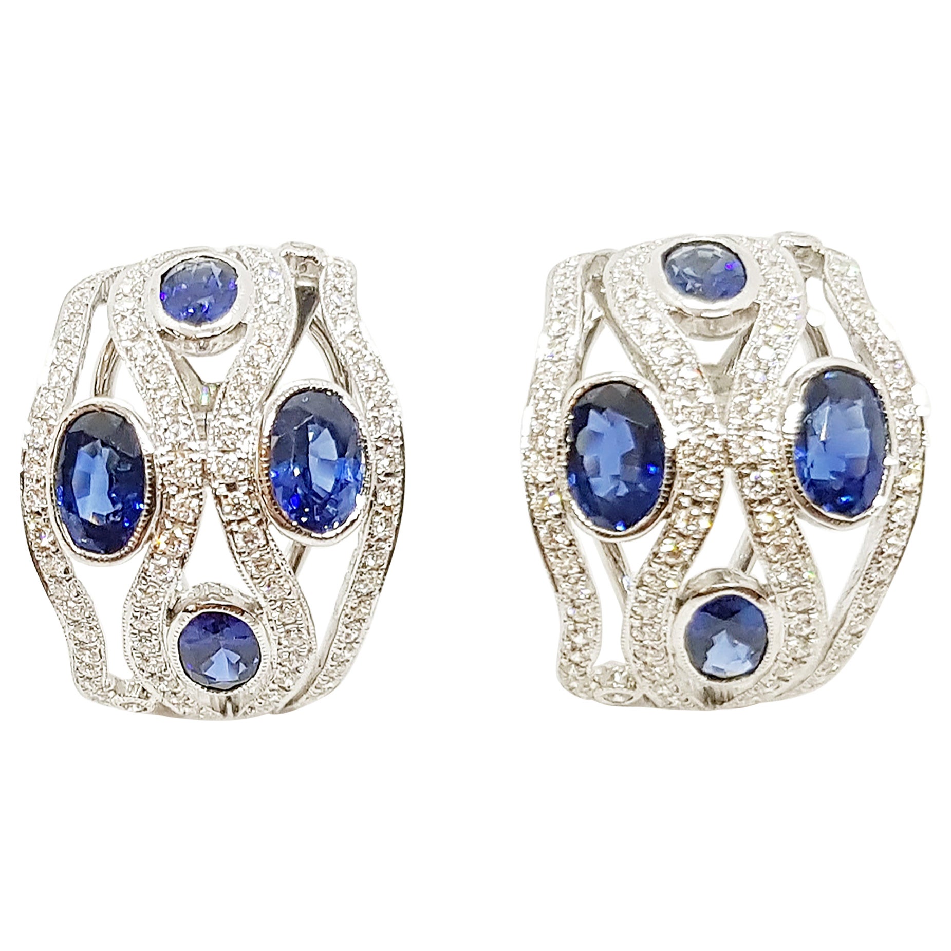 Blue Sapphire with Diamond Earrings Set in 18 Karat White Gold Settings