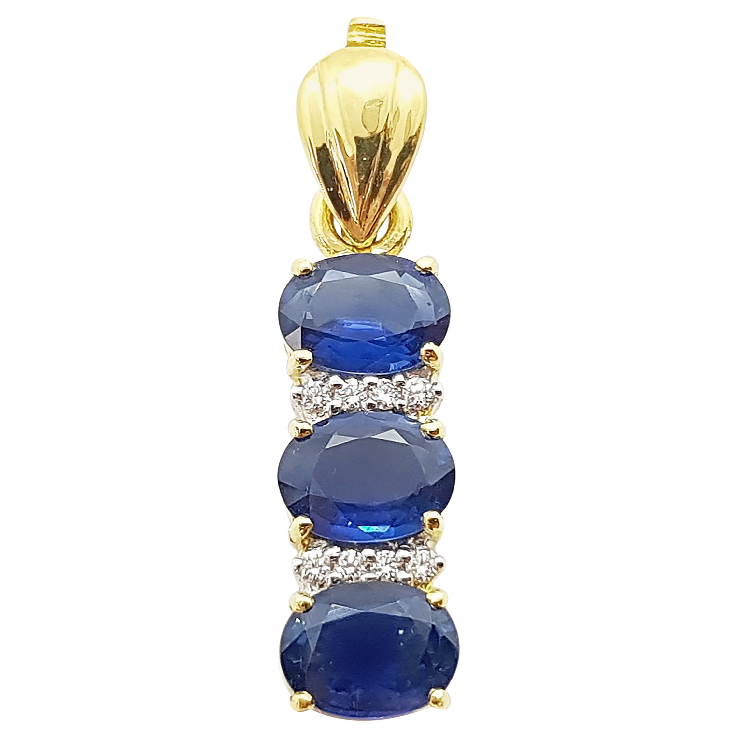 Blue Sapphire with Diamond Pendant Set in 18 Karat Gold Settings For Sale