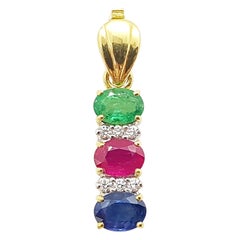 Ruby, Blue Sapphire and Emerald with Diamond Pendant in 18 Karat Gold Settings